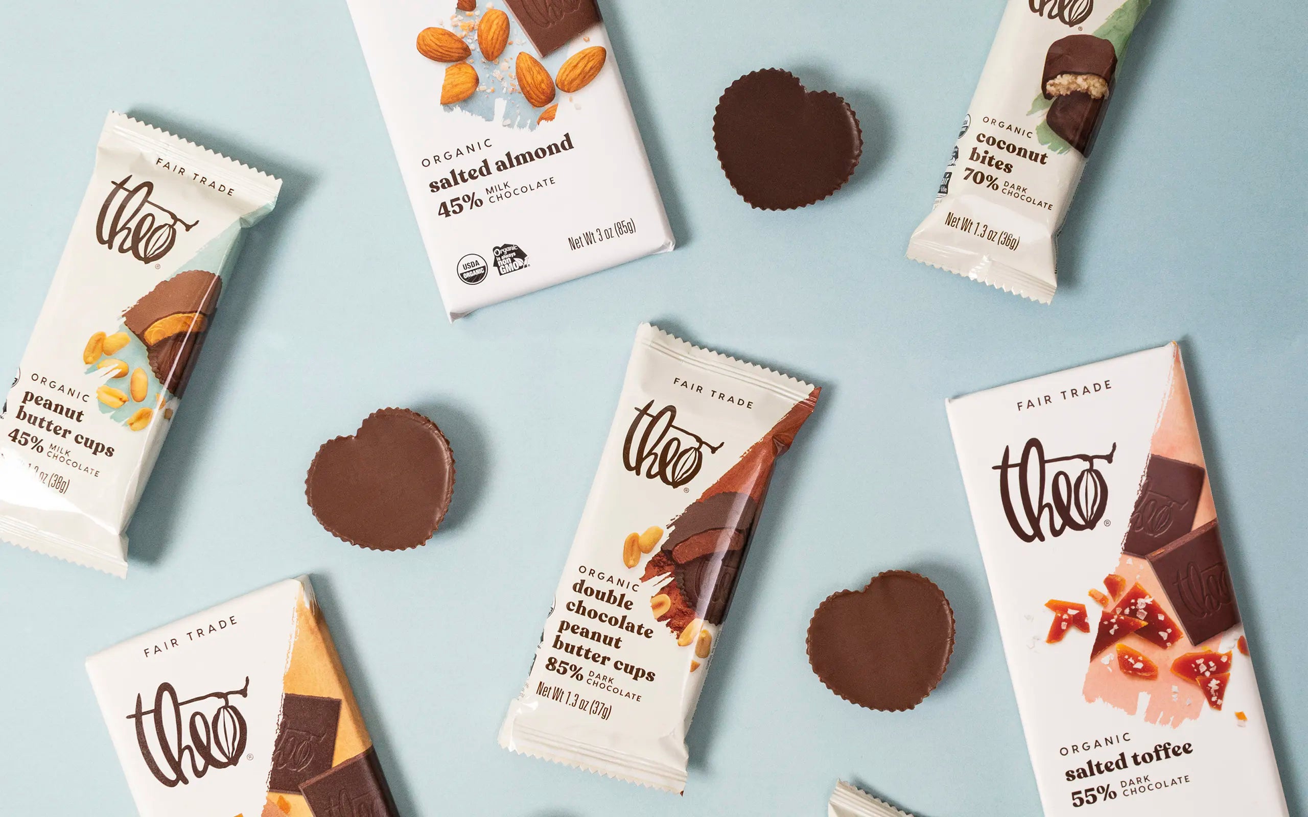 Theo chocolate bars and cookies on a light blue background