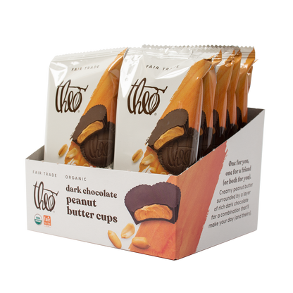 Display box of 12 Theo dark chocolate peanut butter cups on a white background