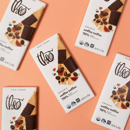 Theo Organic Coffee Toffee chocolate bars on a peach background