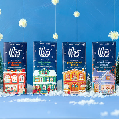 Theo Holiday Variety Pack flavors: Peppermint Crunch, Nutcracker Brittle, Gingerbread Toffee and Salted Maple Crunch bars in a snowy winter scene