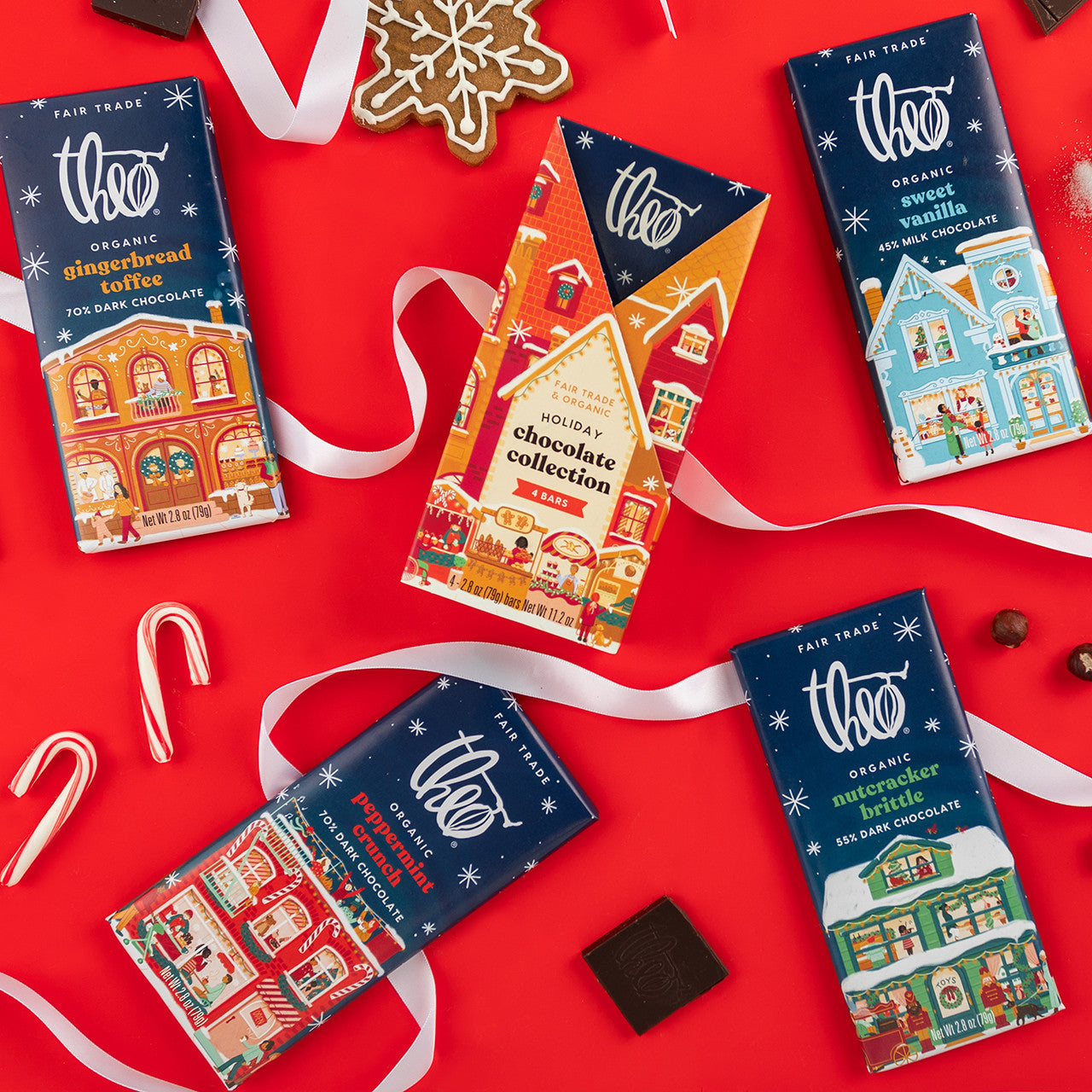 Various chocolate bars with festive packaging on a red background