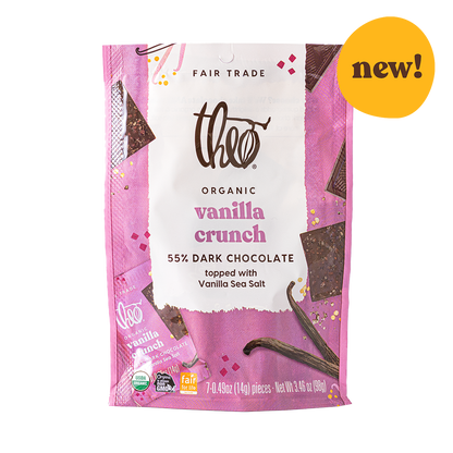 Pink packaging of Theo Organic Vanilla Crunch 55% Dark Chocolate with &