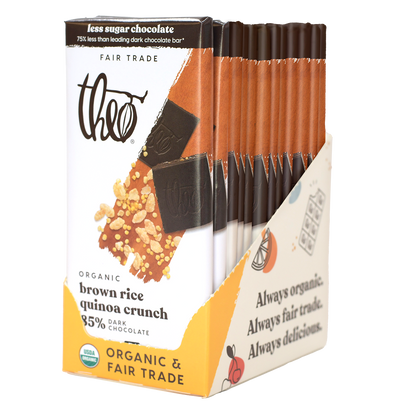 Box of 12 Theo Organic brown rice quinoa crunch dark chocolate bars on a white background