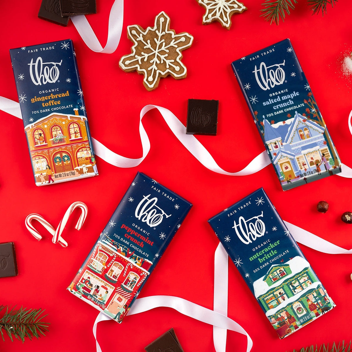 Theo holiday bars on red with ribbon, gingerbread and candy canes