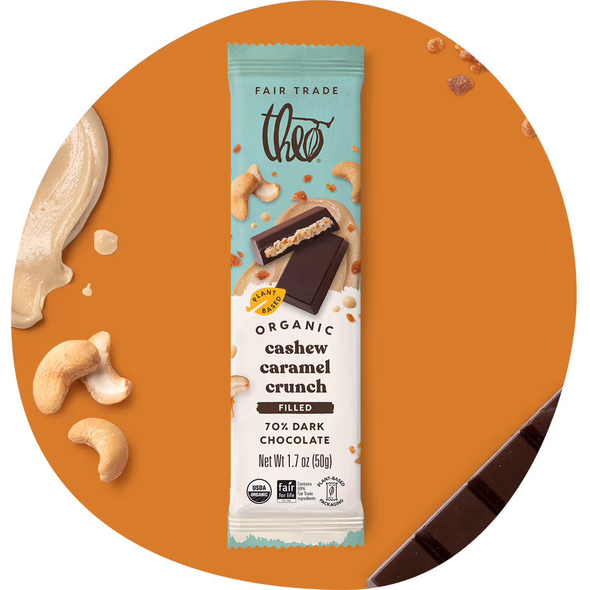 Theo cashew caramel crunch filled 70% dark chocolate bar on an orange background